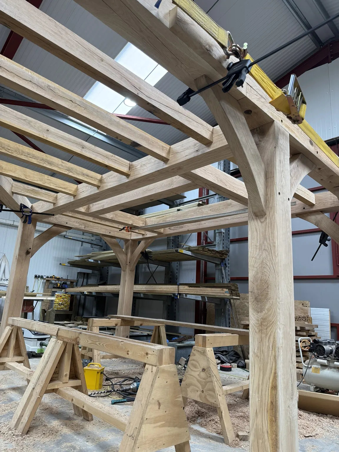 Oak frame assembled in the workshop with curved braces and rafters